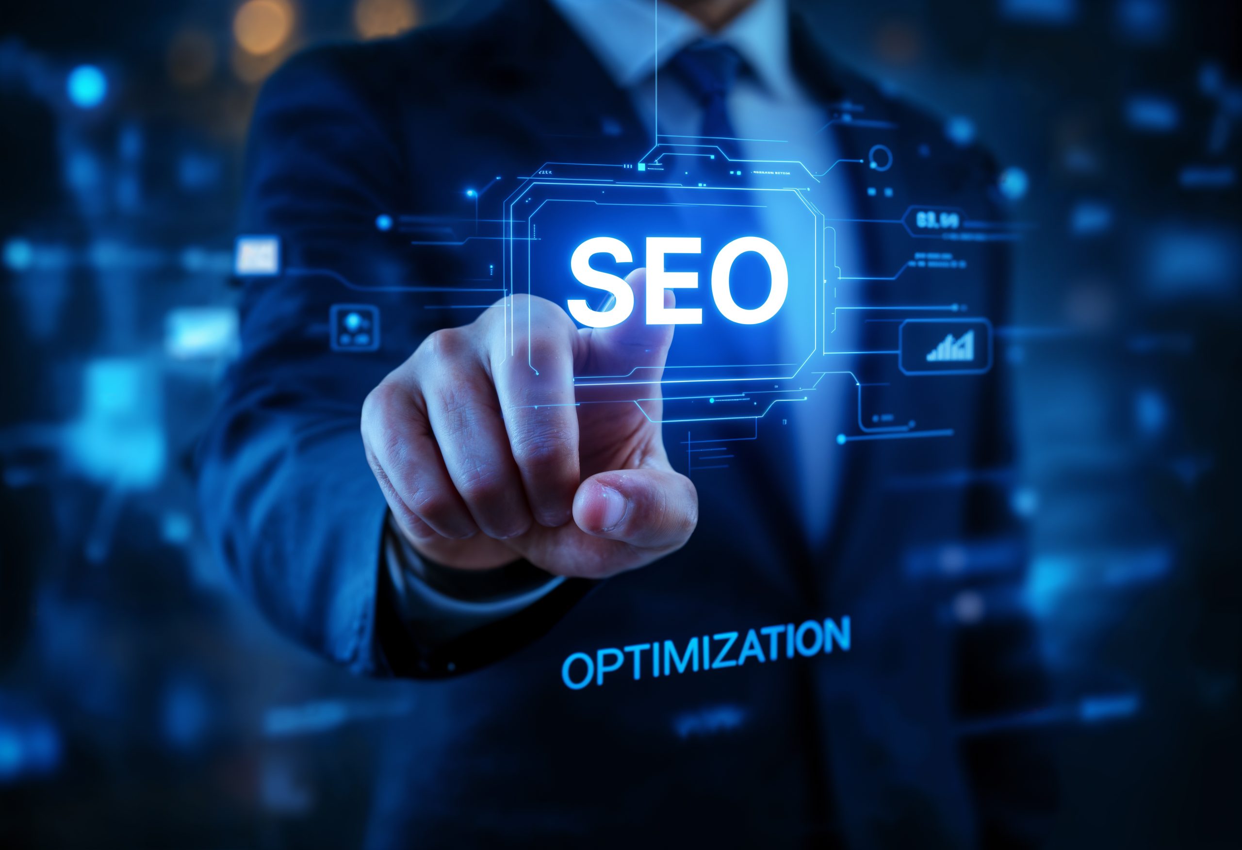 Digital marketer pointing at SEO icon on virtual screen